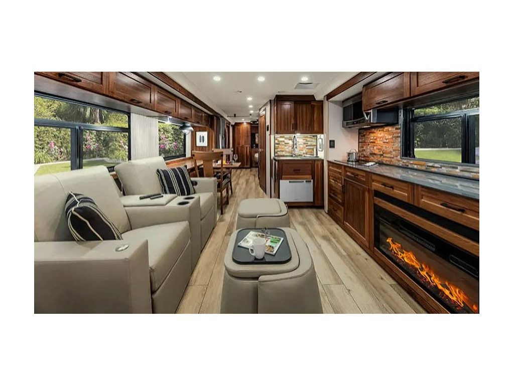 Interior of new Winnebago Journey with fireplace on