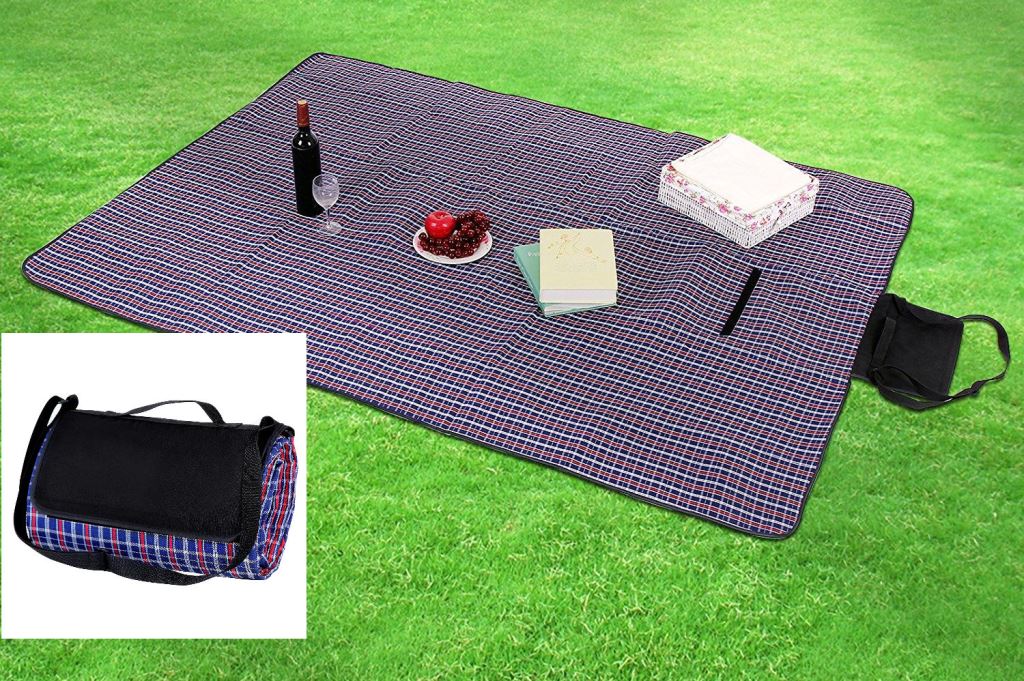Packable beach blanket shown in stored position; blanket also shown in use, laid out with refreshments, fruits and books on a neatly manicured lawn