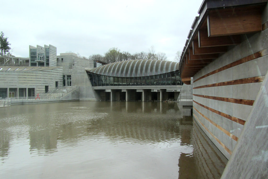 Exterior of the Crystal Bridges American Art Museum with water below