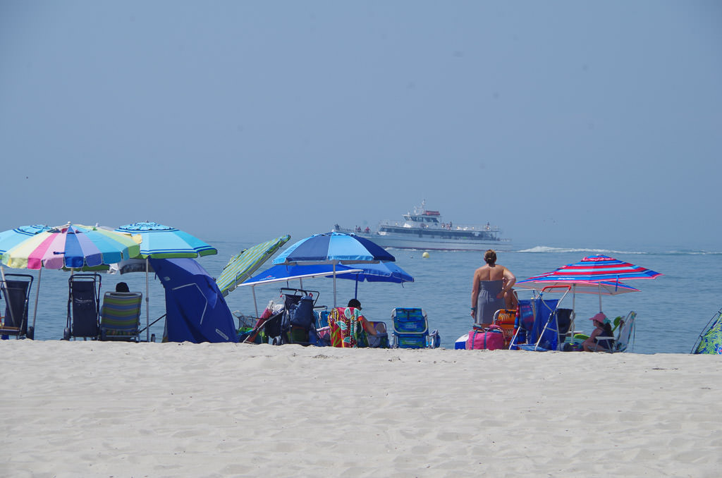 Many people along the beach on Jersey shore