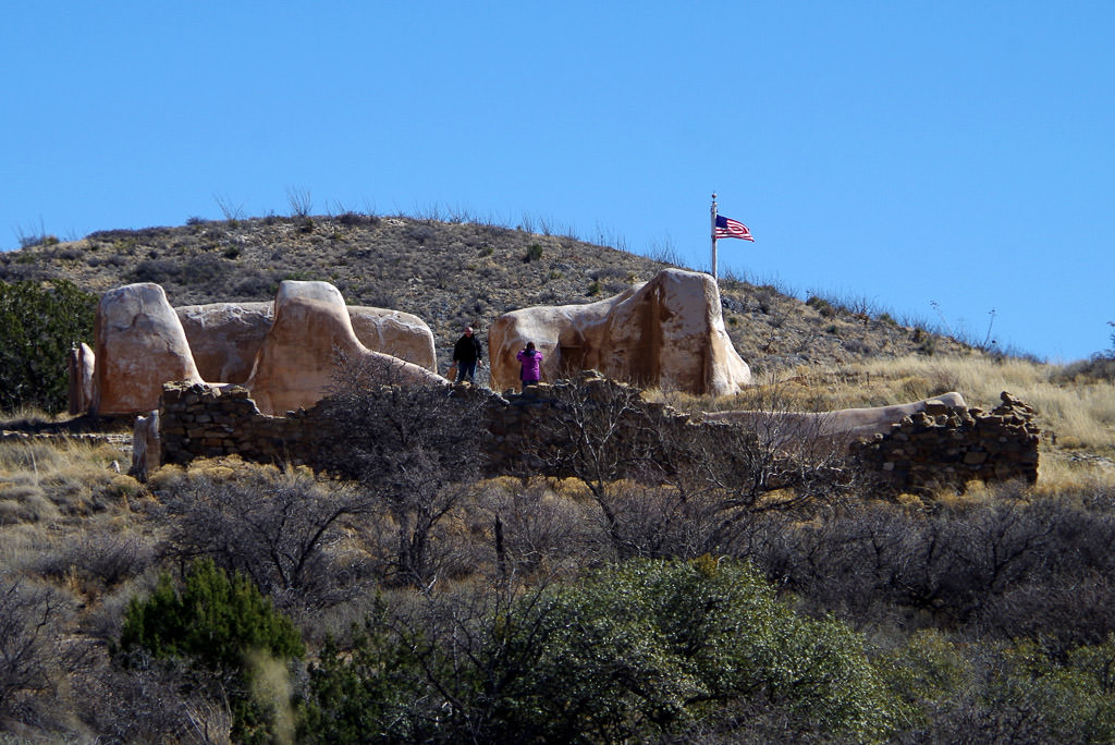 Two people standing on Fort Bowie ruins.