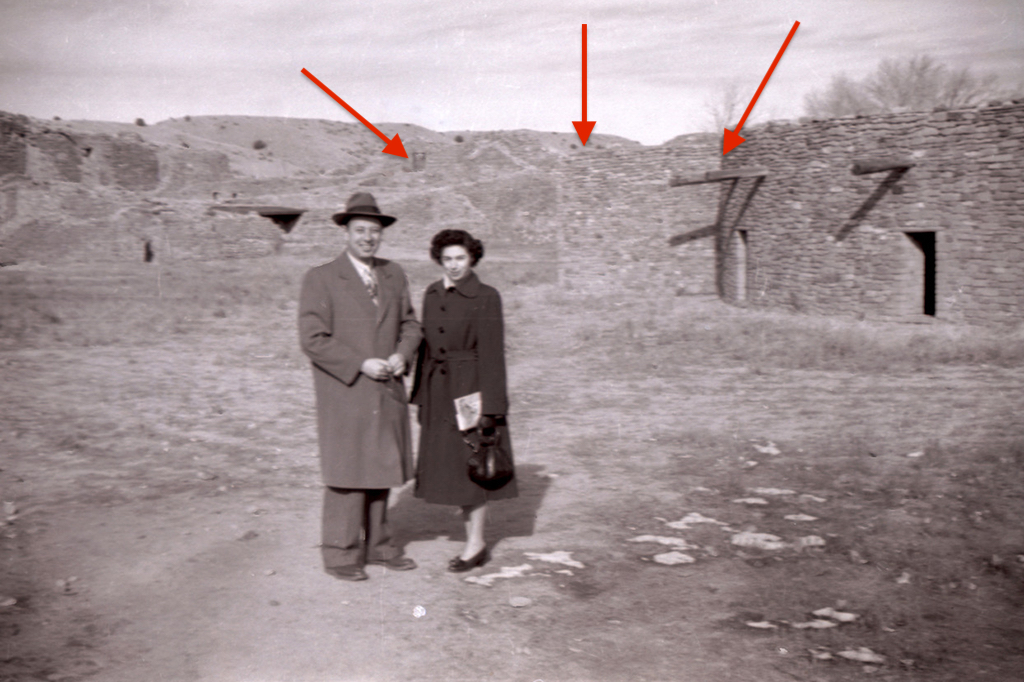 First photo of Don's parents standing in front of building ruins this time with arrows pointing to identifying structures.