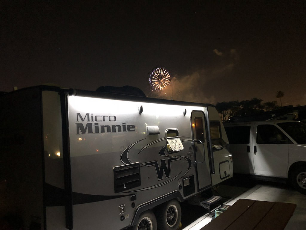Winnebago Micro Minnie with fireworks overhead.