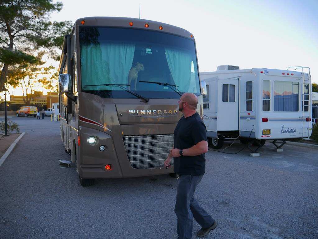 Kenny walking around RV for final check